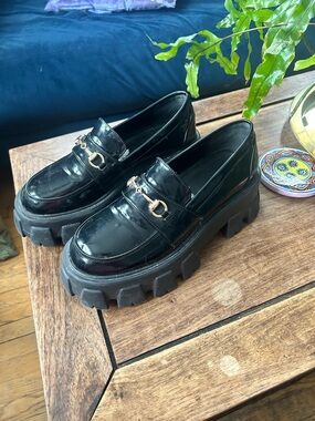 PrettyLittleThing Black Patent Lug Sole Loafers with Gold Metal